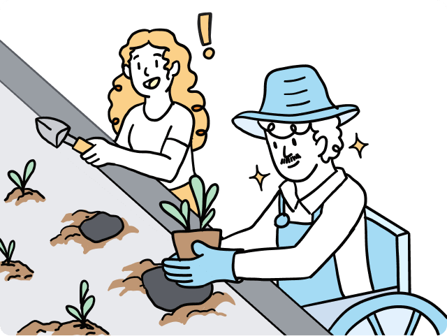 An experienced farmer in a wheelchair guiding a new farmer in fostering an accessibility garden in raised beds.